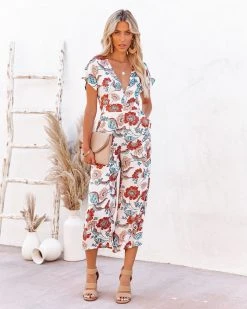 OLIV-001 Hollow Floral Pocketed Tie Jumpsuit - FINAL SALE